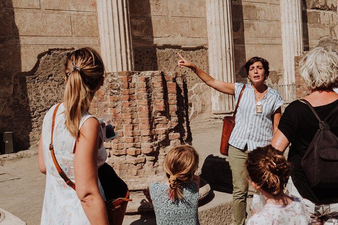 Explore Pompeii with an Archaeologist - Meeting Porta Marina Superiore with a sign and a plan