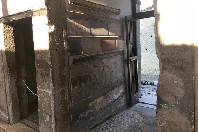 Herculaneum - Small Group Tour - The Seafront Stop: Beach Tragedy and a Preserved Wooden Boat
