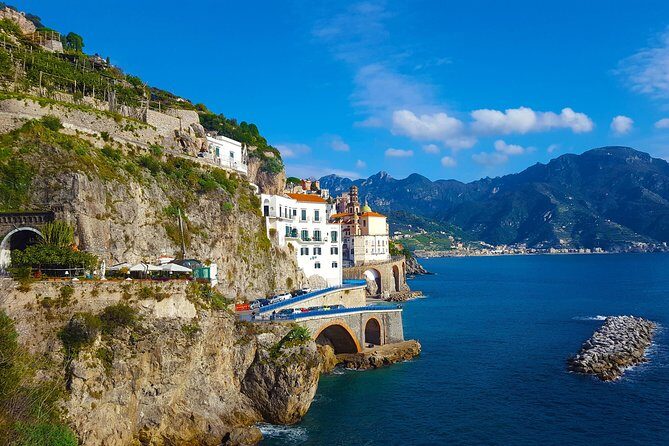 Pompeii, Positano,Sorrento with guide, tickets and lunch all included - Spiaggia di Positano and Marina Grande: color, steps, and quick shopping stops